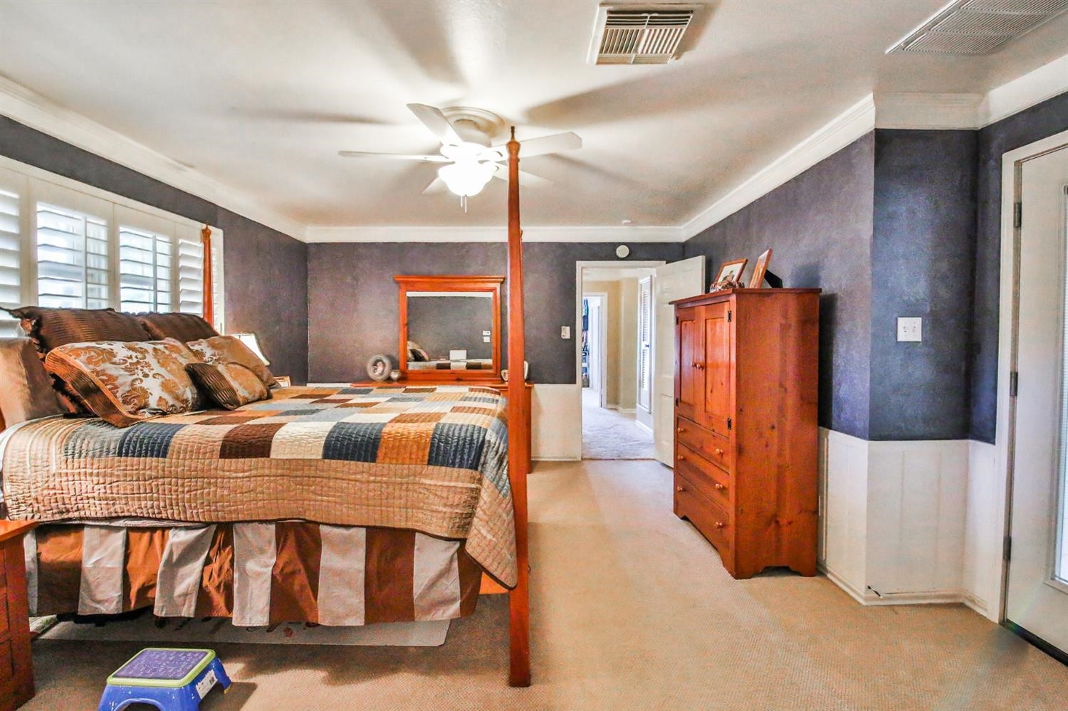 3204 55th Street Lubbock, TX 79413 - Photo 22 of 41 a living room with furniture and a chandelier