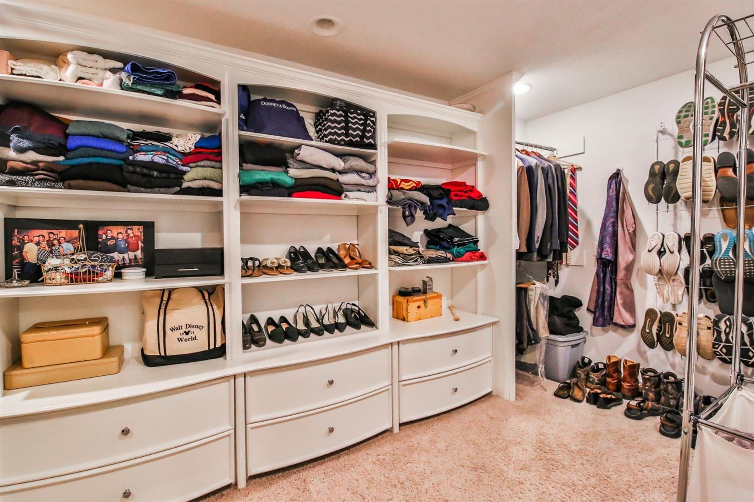 3204 55th Street Lubbock, TX 79413 - Photo 29 of 41 a view of walk in closet with clothes and shoes