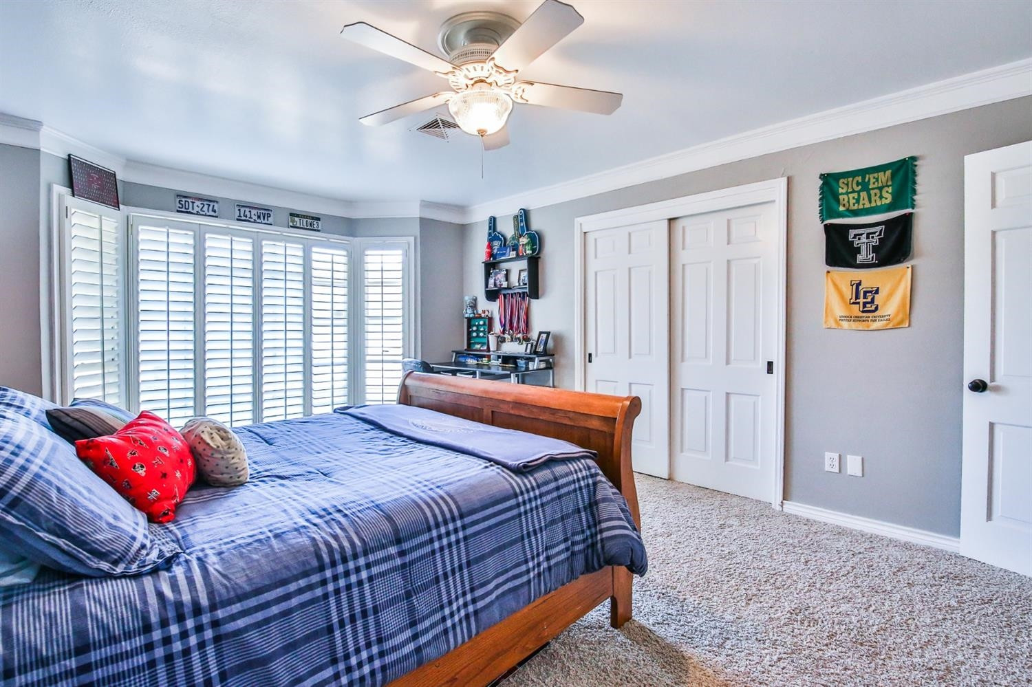 3204 55th Street Lubbock, TX 79413 - Photo 33 of 41 a bedroom with a bed dresser and window