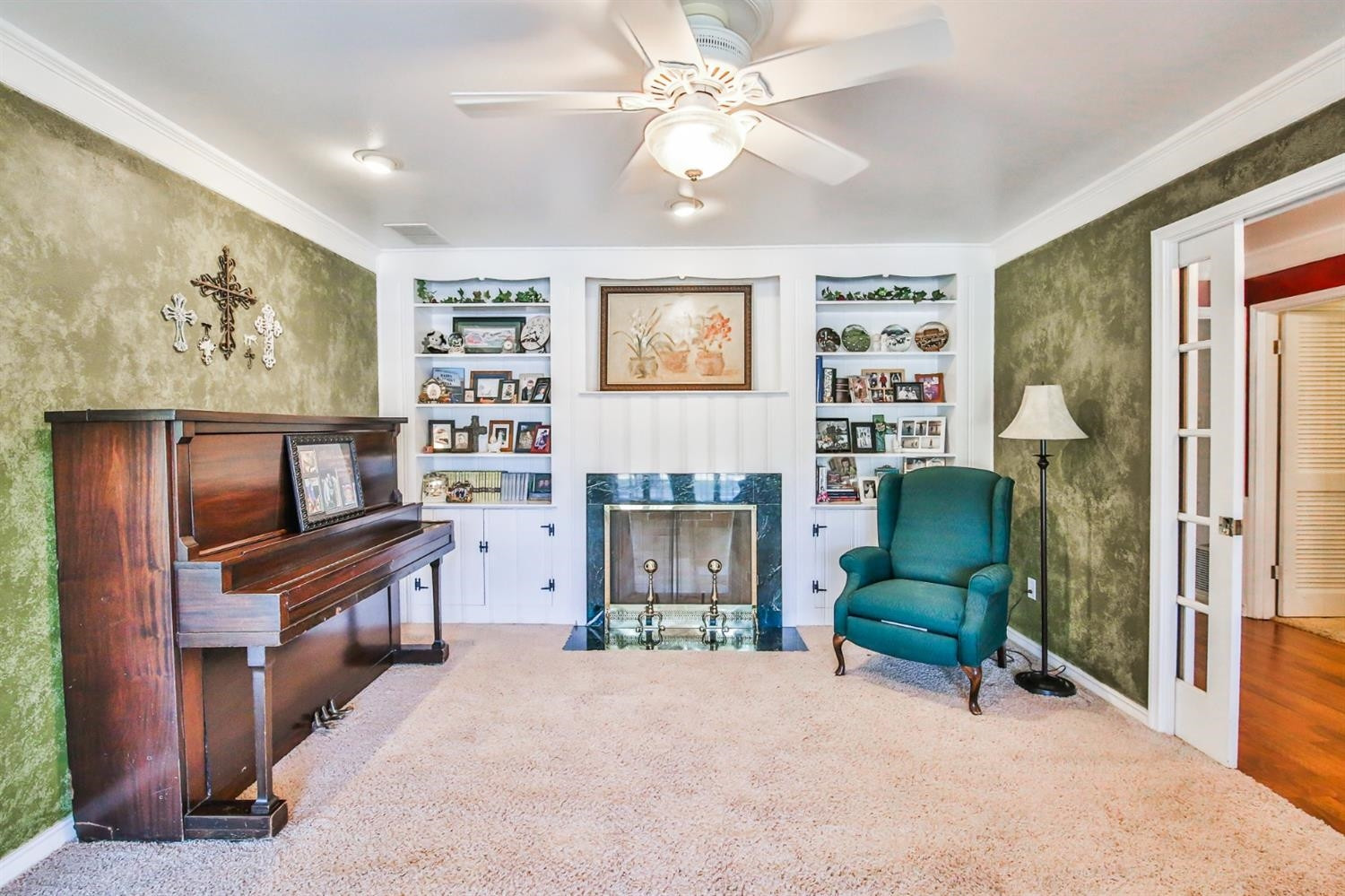 3204 55th Street Lubbock, TX 79413 - Photo 7 of 41 a living room with furniture and a fireplace