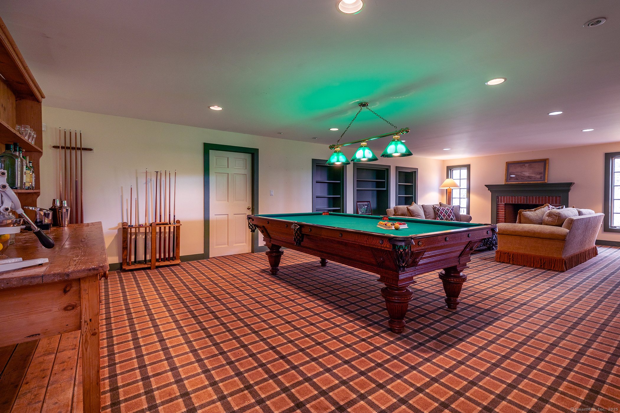 11 Raven Rock Road Roxbury, CT 06783 - Photo 18 of 35 a living room with furniture a pool table and a large window