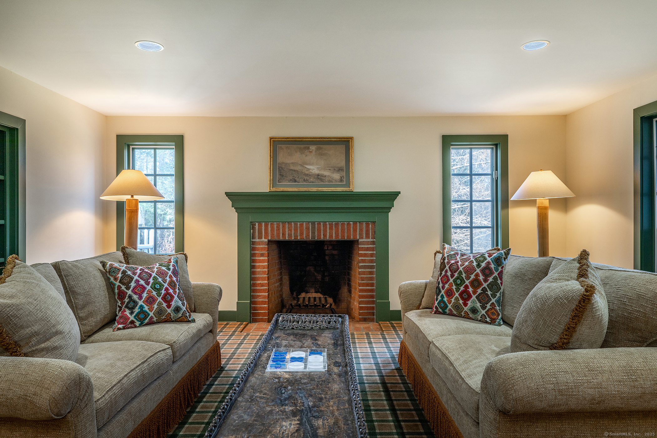 11 Raven Rock Road Roxbury, CT 06783 - Photo 19 of 35 a living room with furniture and a fireplace