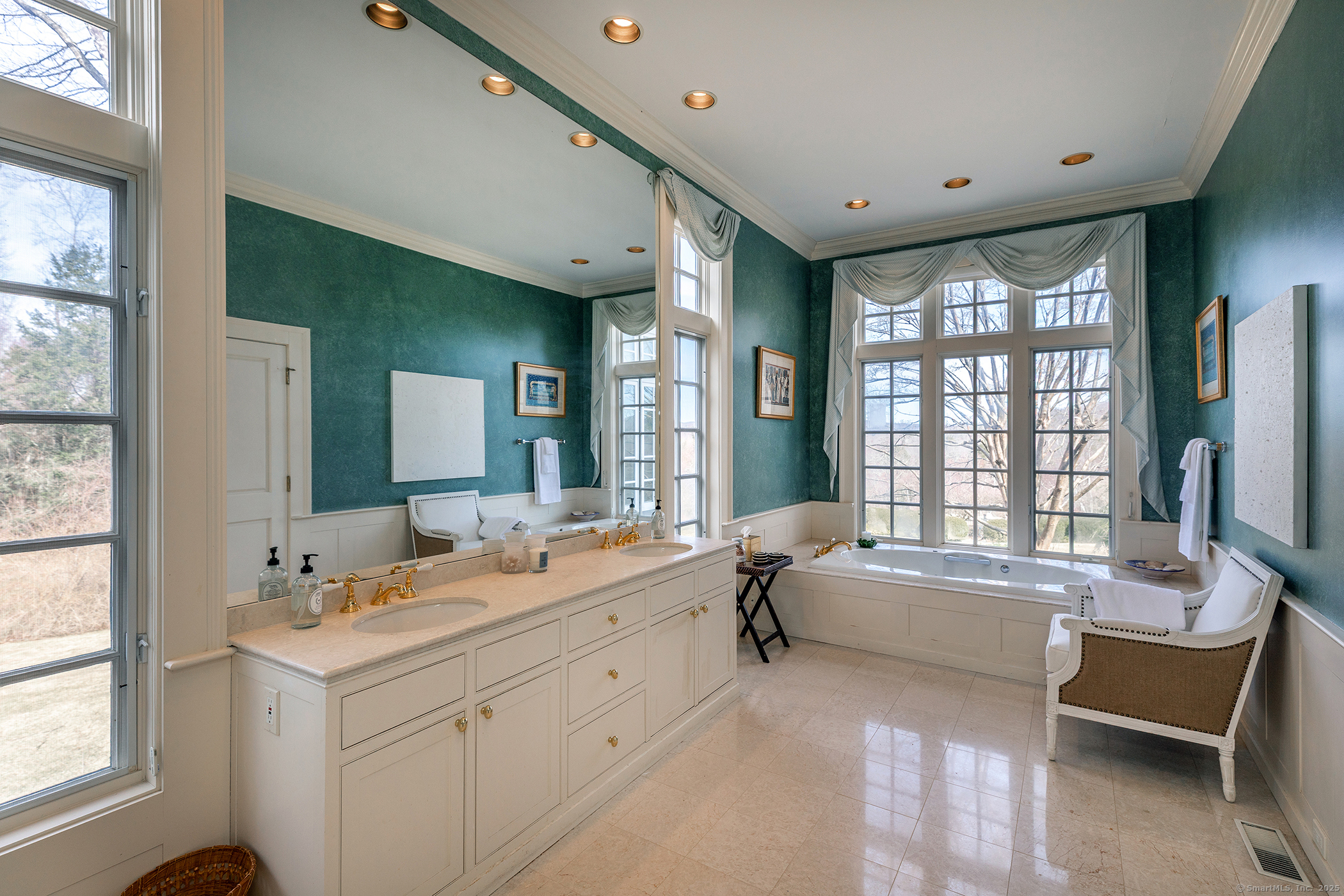 11 Raven Rock Road Roxbury, CT 06783 - Photo 20 of 34 a bathroom with a double vanity sink bathtub and next to a window