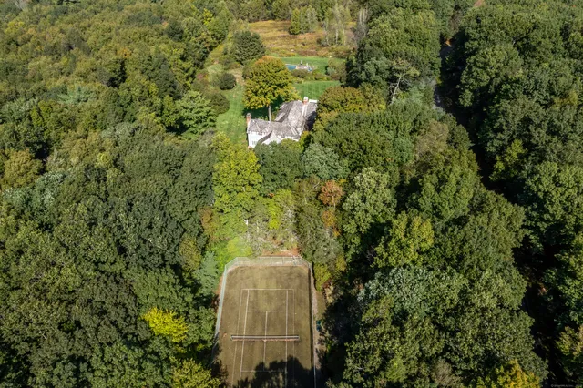 a building with trees in the background