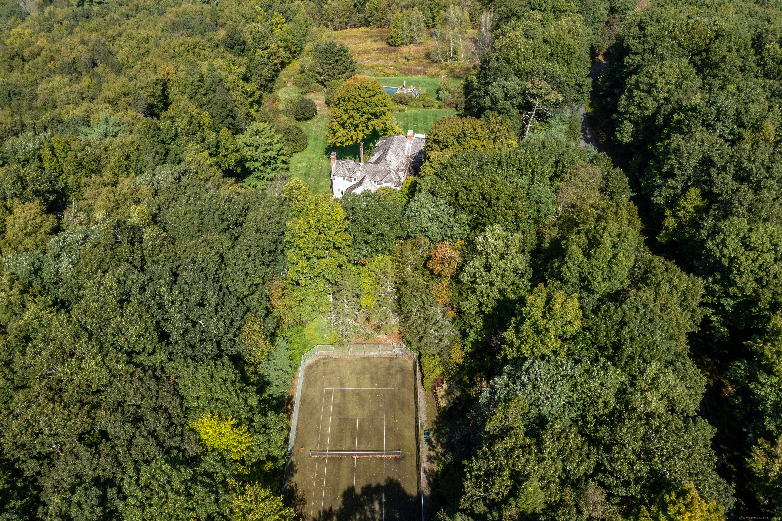 11 Raven Rock Road Roxbury, CT 06783 - Photo 4 of 35 a building with trees in the background