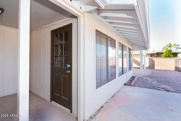 a view of entryway and hall with a window