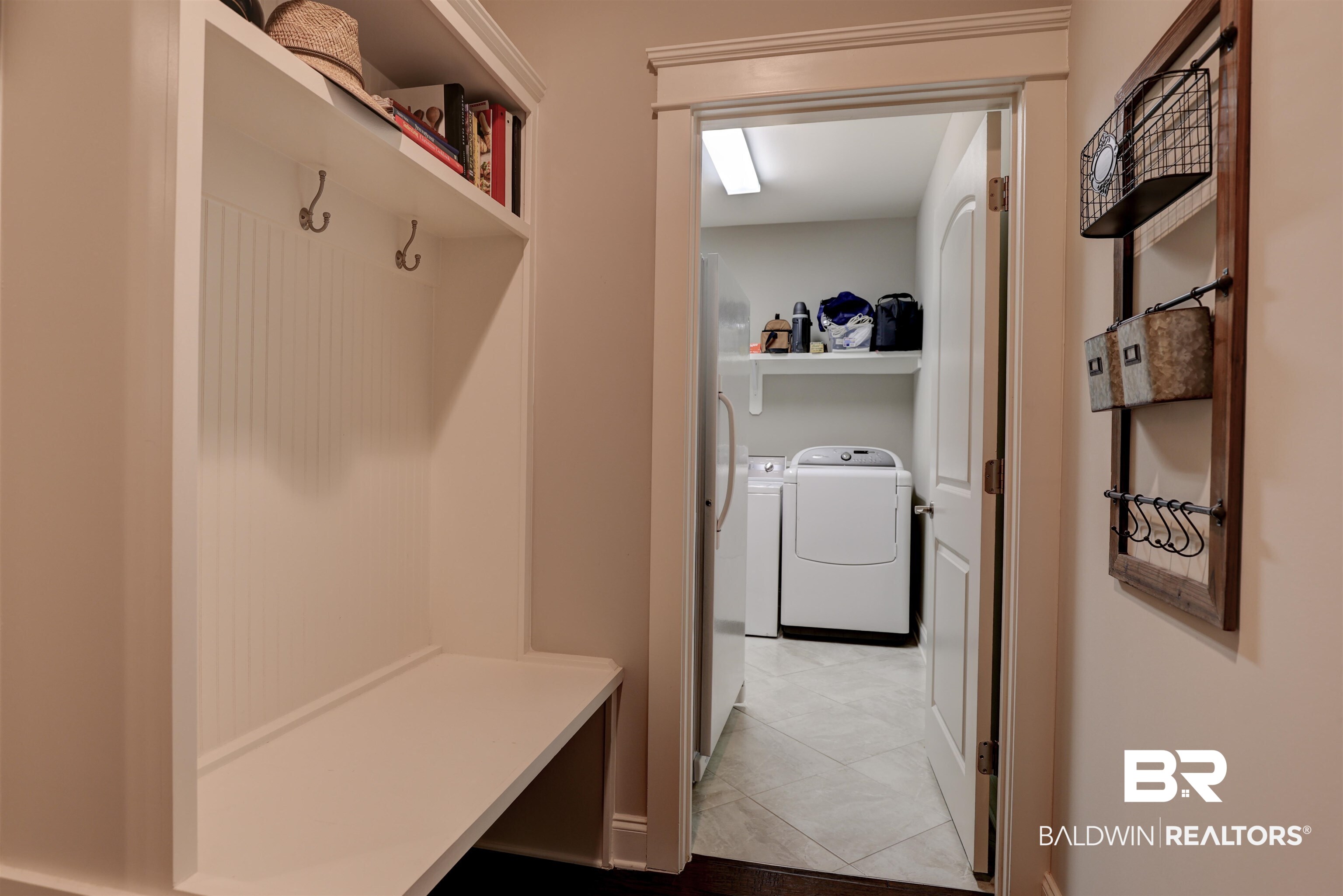 10588 Leesburg Pike Daphne, AL 36526 - Photo 24 of 29 Mudroom featuring light tile patterned flooring and washer and dryer