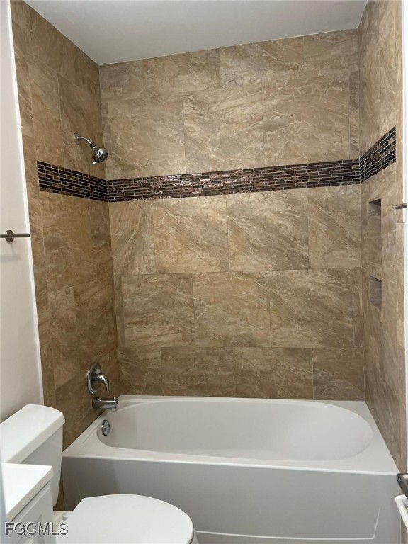 3325 Airport Road North, Unit T6 Naples, FL 34105 - Photo 12 of 13 a bathroom with a shower and a toilet