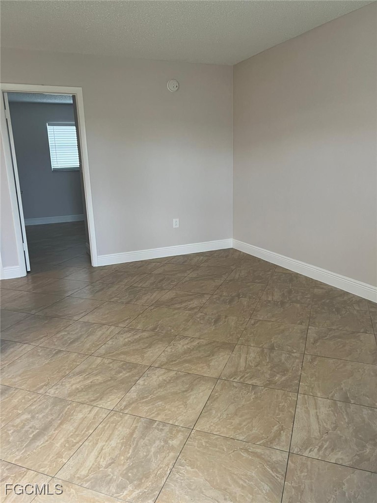 3325 Airport Road North, Unit T6 Naples, FL 34105 - Photo 5 of 13 a view of an empty room