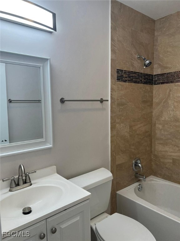 3325 Airport Road North, Unit T6 Naples, FL 34105 - Photo 6 of 13 a bathroom with a sink toilet and shower