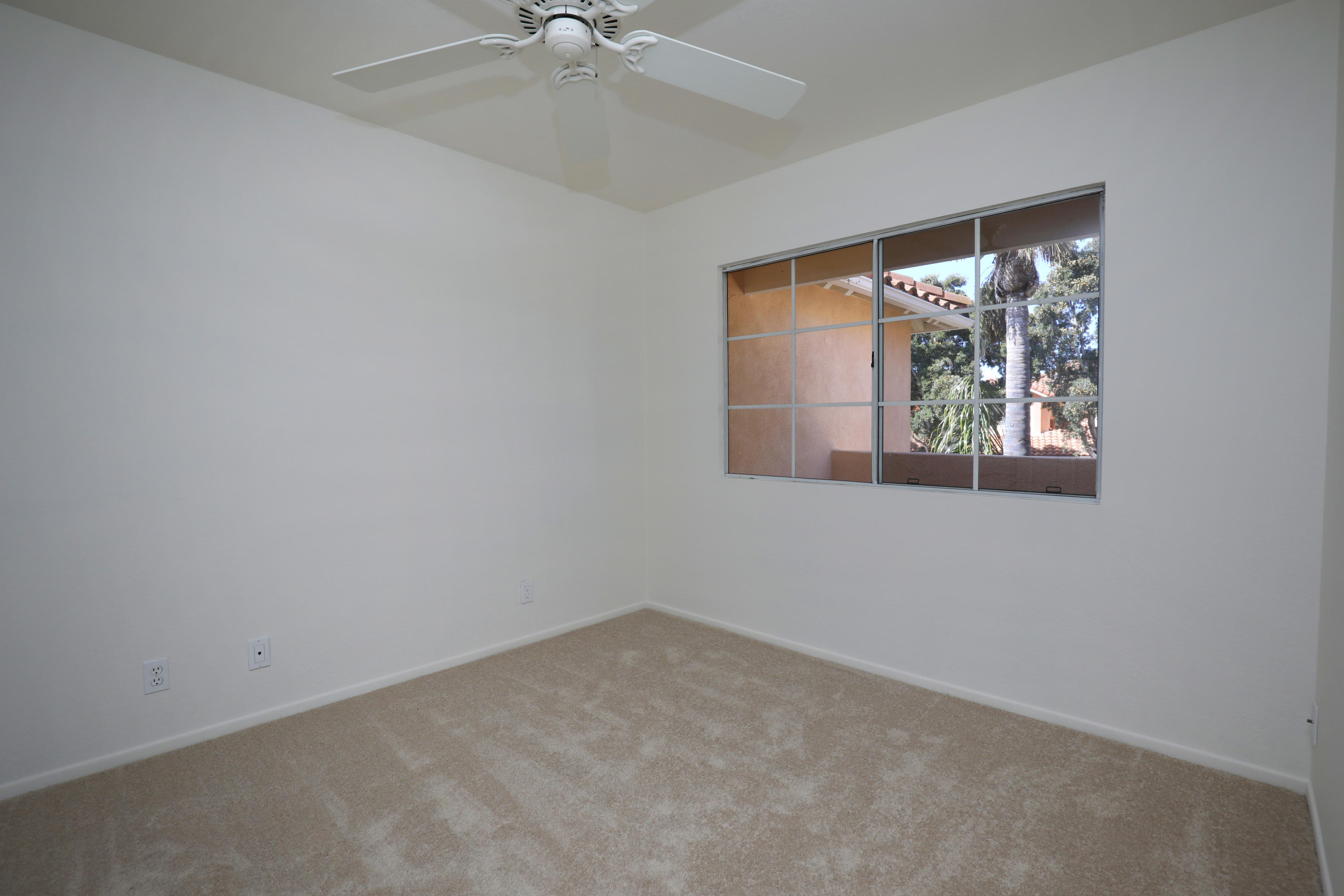 315 Pacific Oaks Road Goleta, CA 93117 - Photo 13 of 20 an empty room with a window