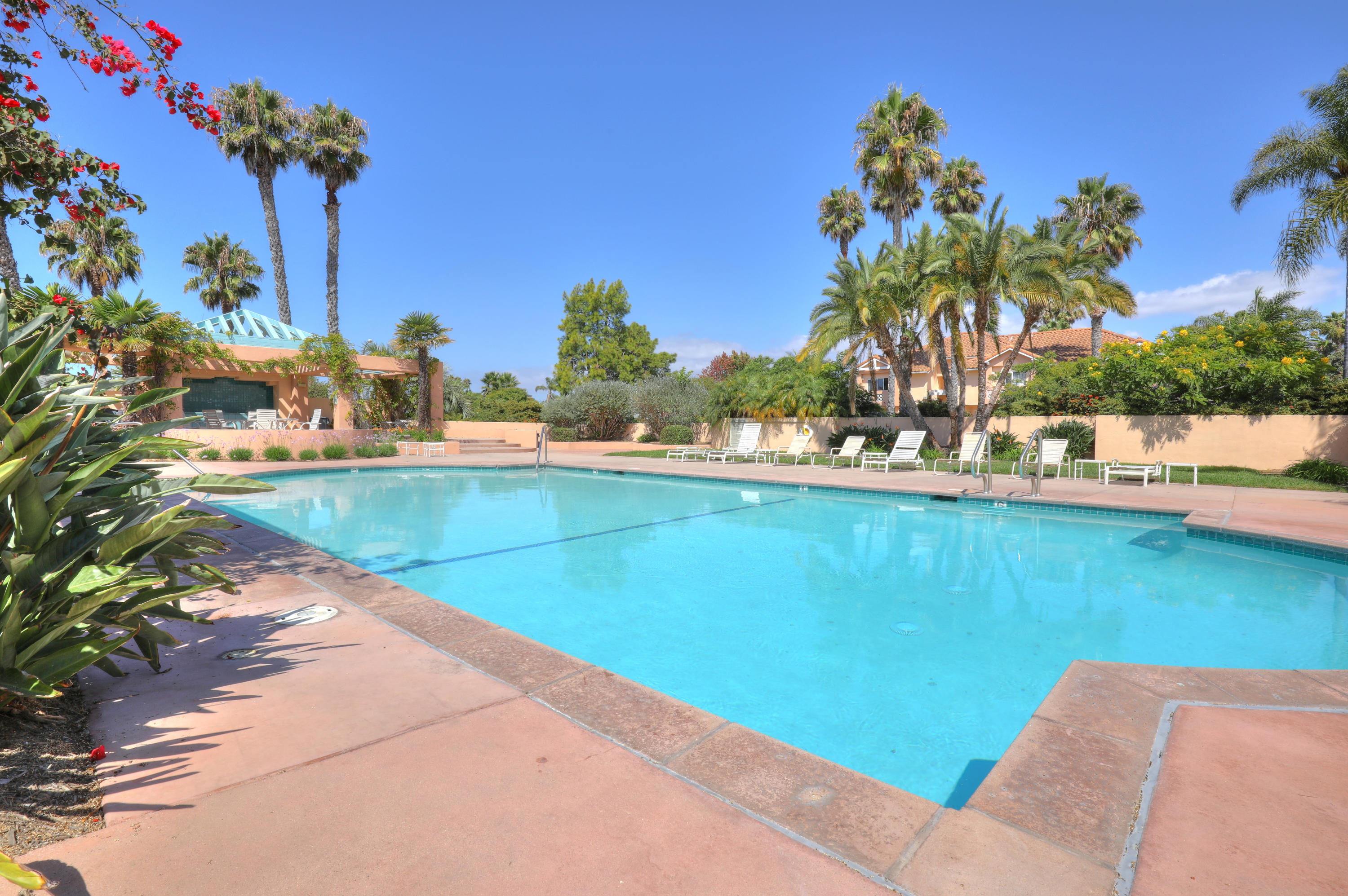 315 Pacific Oaks Road Goleta, CA 93117 - Photo 19 of 20 a view of a swimming pool and a yard