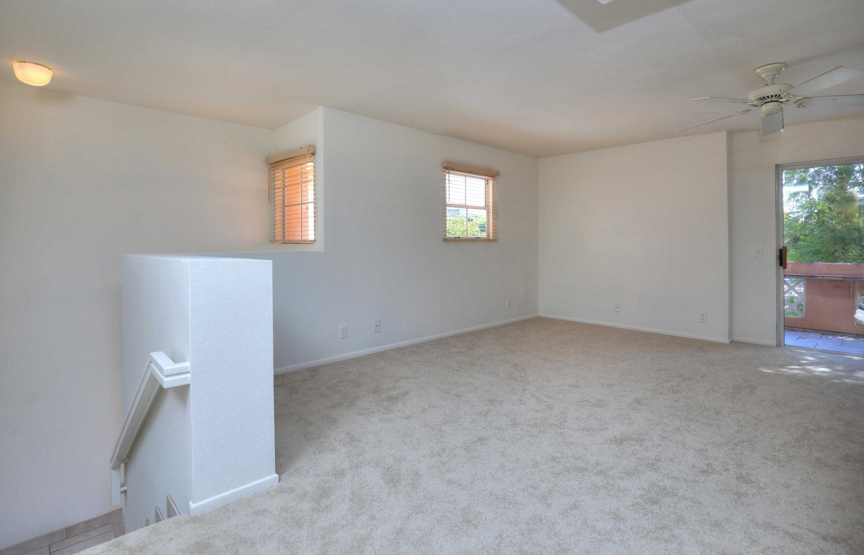 315 Pacific Oaks Road Goleta, CA 93117 - Photo 3 of 20 an empty room with windows