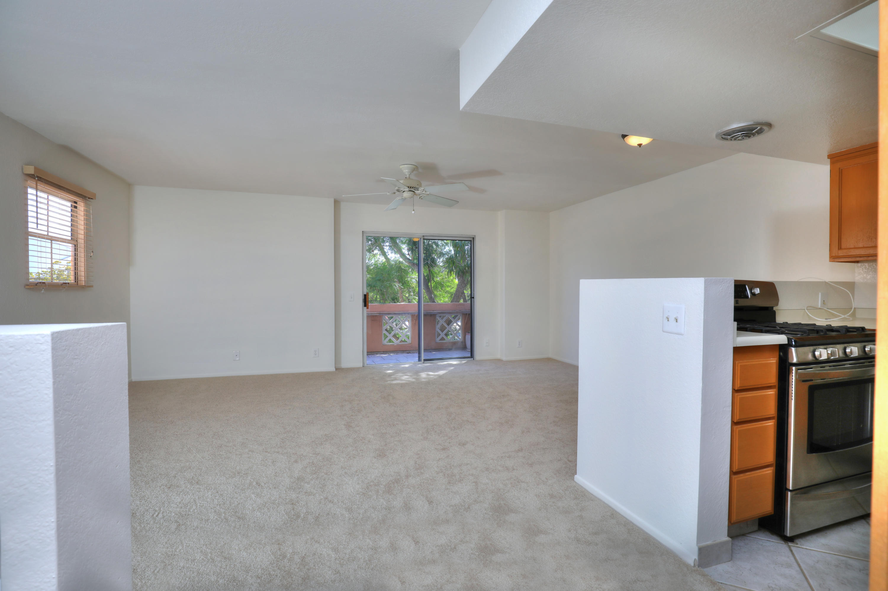 315 Pacific Oaks Road Goleta, CA 93117 - Photo 4 of 20 a view of a kitchen with a refrigerator stove top oven and cabinets