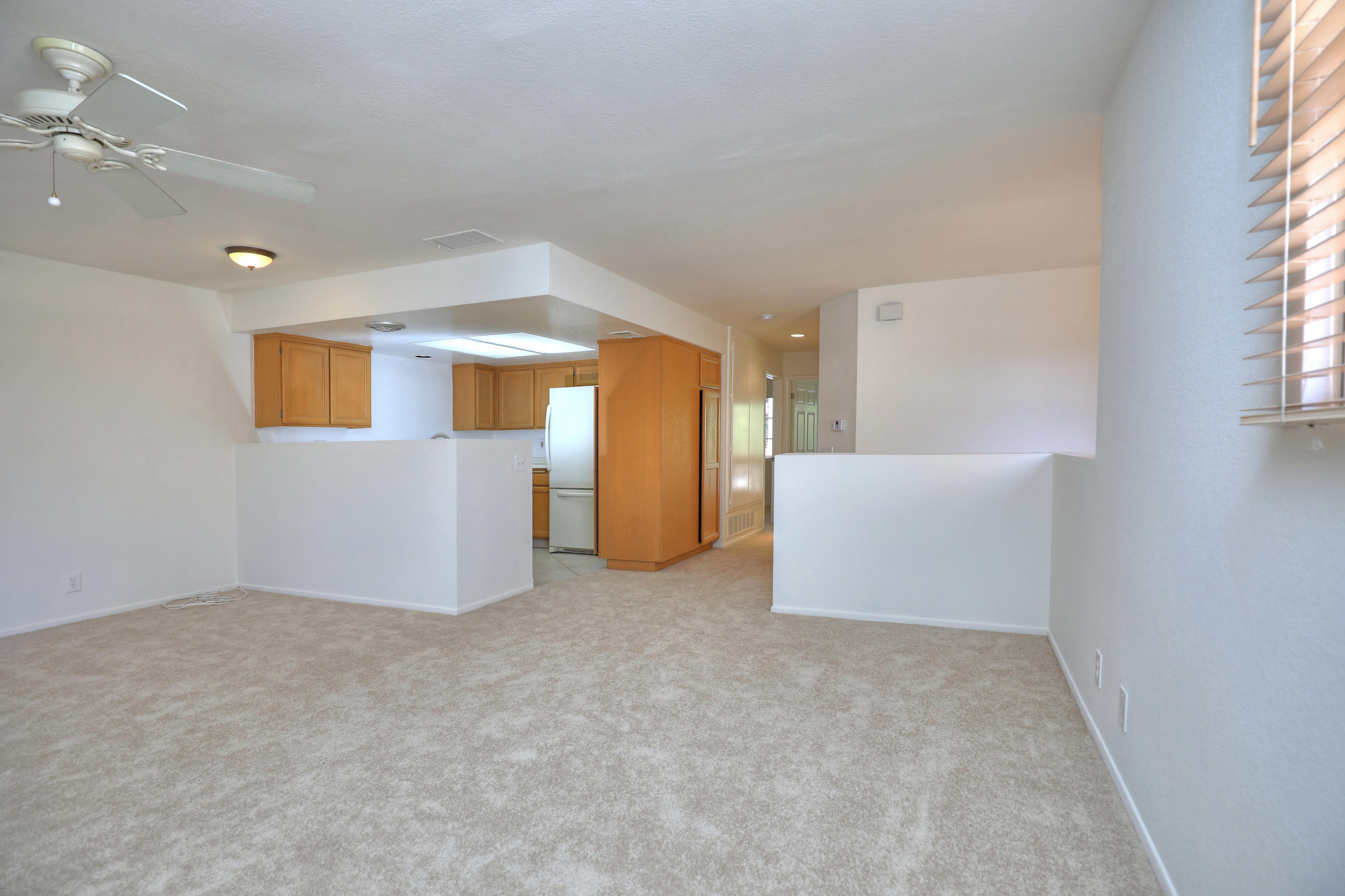 315 Pacific Oaks Road Goleta, CA 93117 - Photo 6 of 20 a view of an empty room with a window