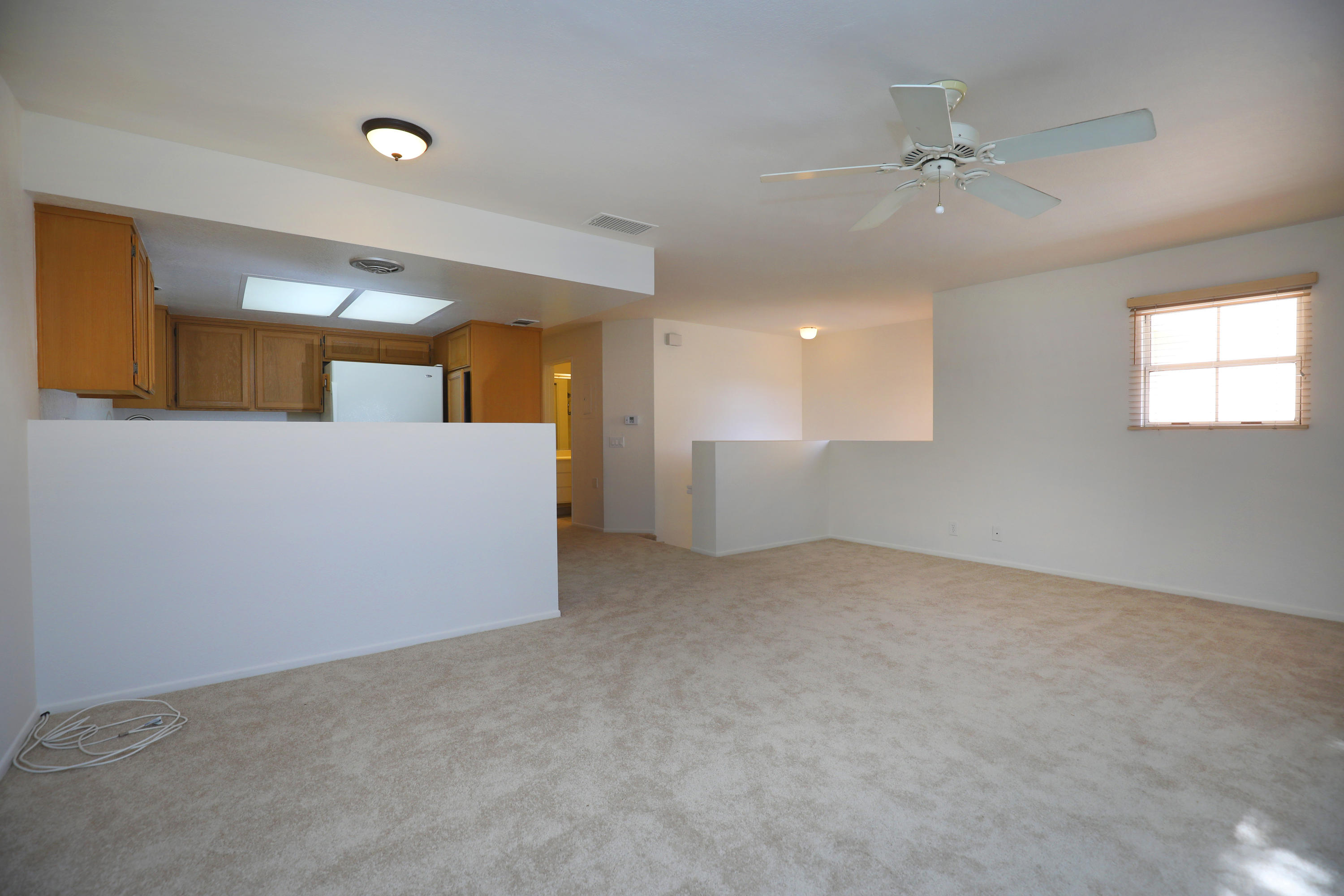315 Pacific Oaks Road Goleta, CA 93117 - Photo 7 of 20 a view of an empty room with a window