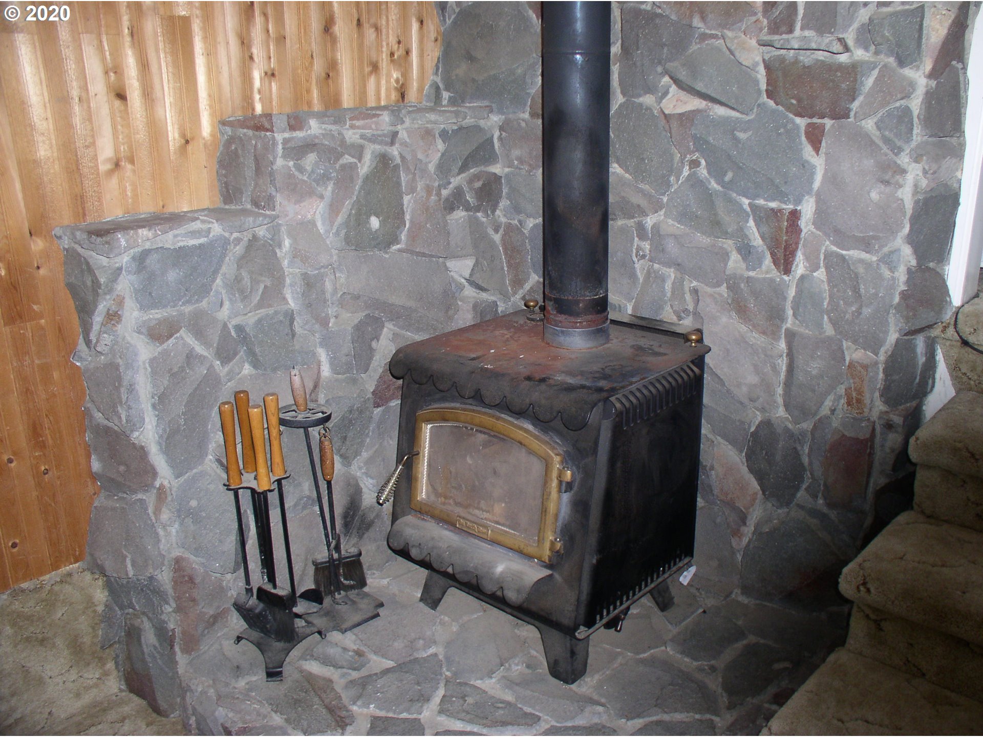 42025 Southeast Coalman Road Sandy, OR 97055 - Photo 13 of 22 a stove top oven sitting next to a window