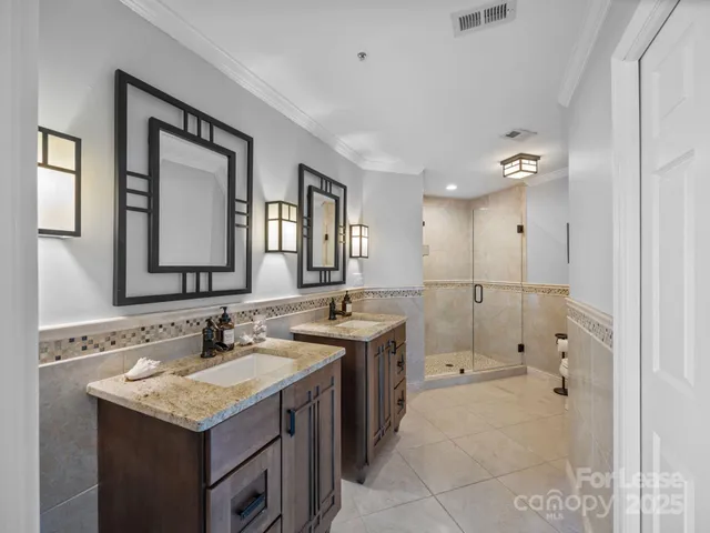 a bathroom with a sink and mirror
