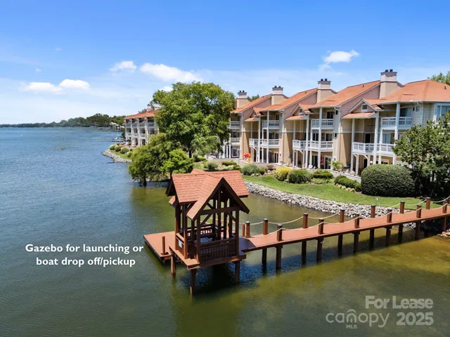 a view of swimming pool with outdoor seating