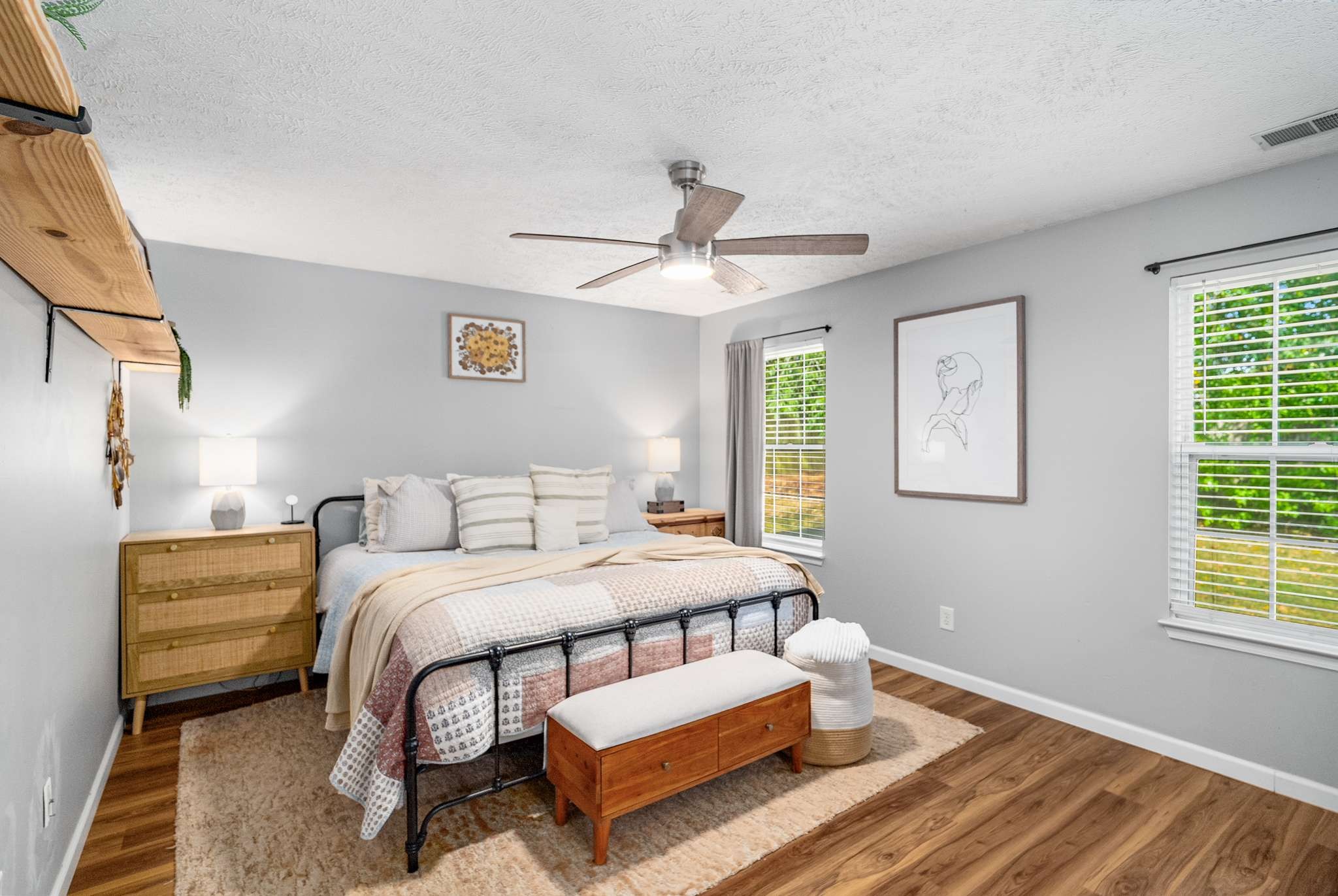 7222 Hidden Lake Drive Fairview, TN 37062 - Photo 14 of 21 a bedroom with a bed and a chandelier