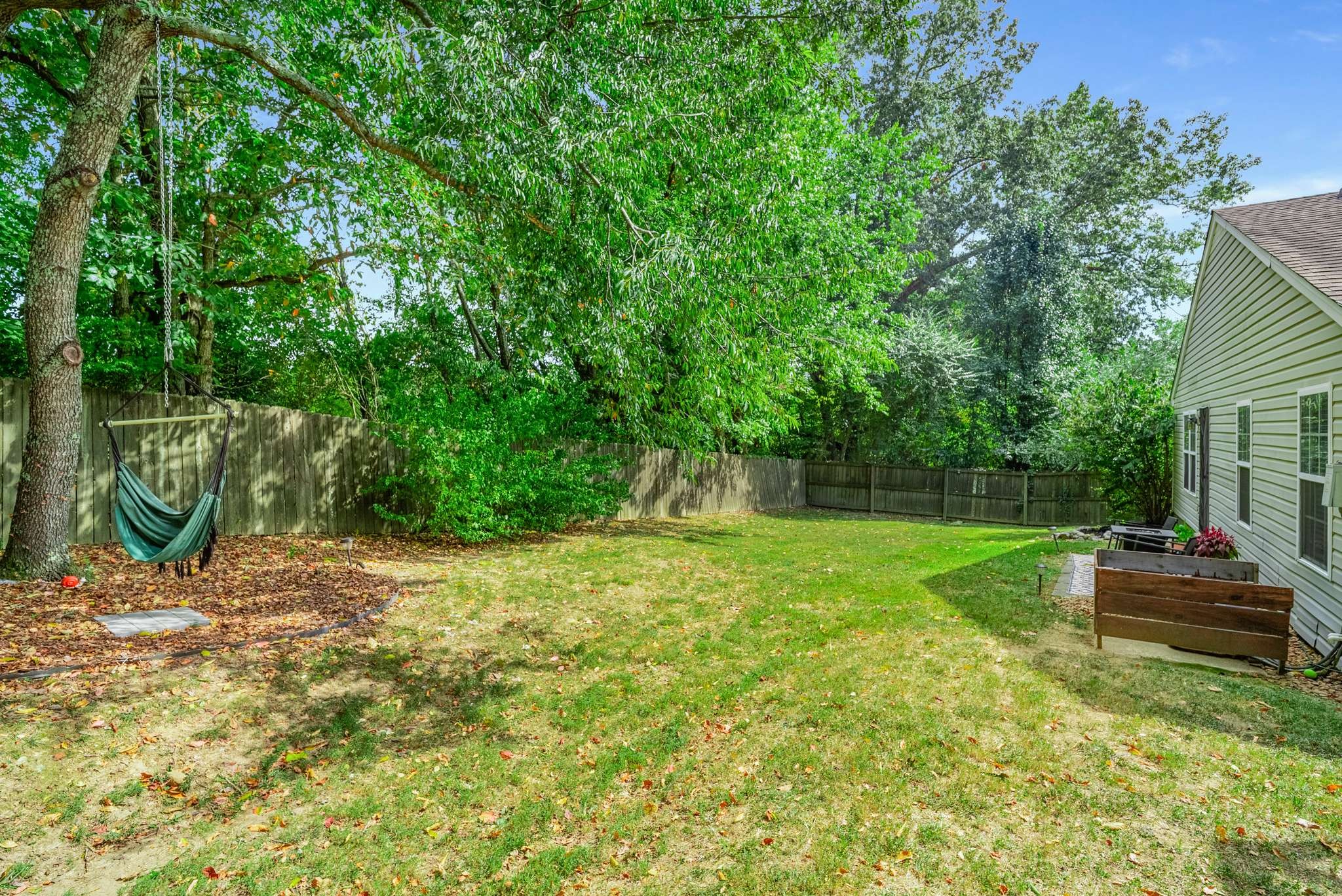 7222 Hidden Lake Drive Fairview, TN 37062 - Photo 19 of 21 a backyard of a house with seating space