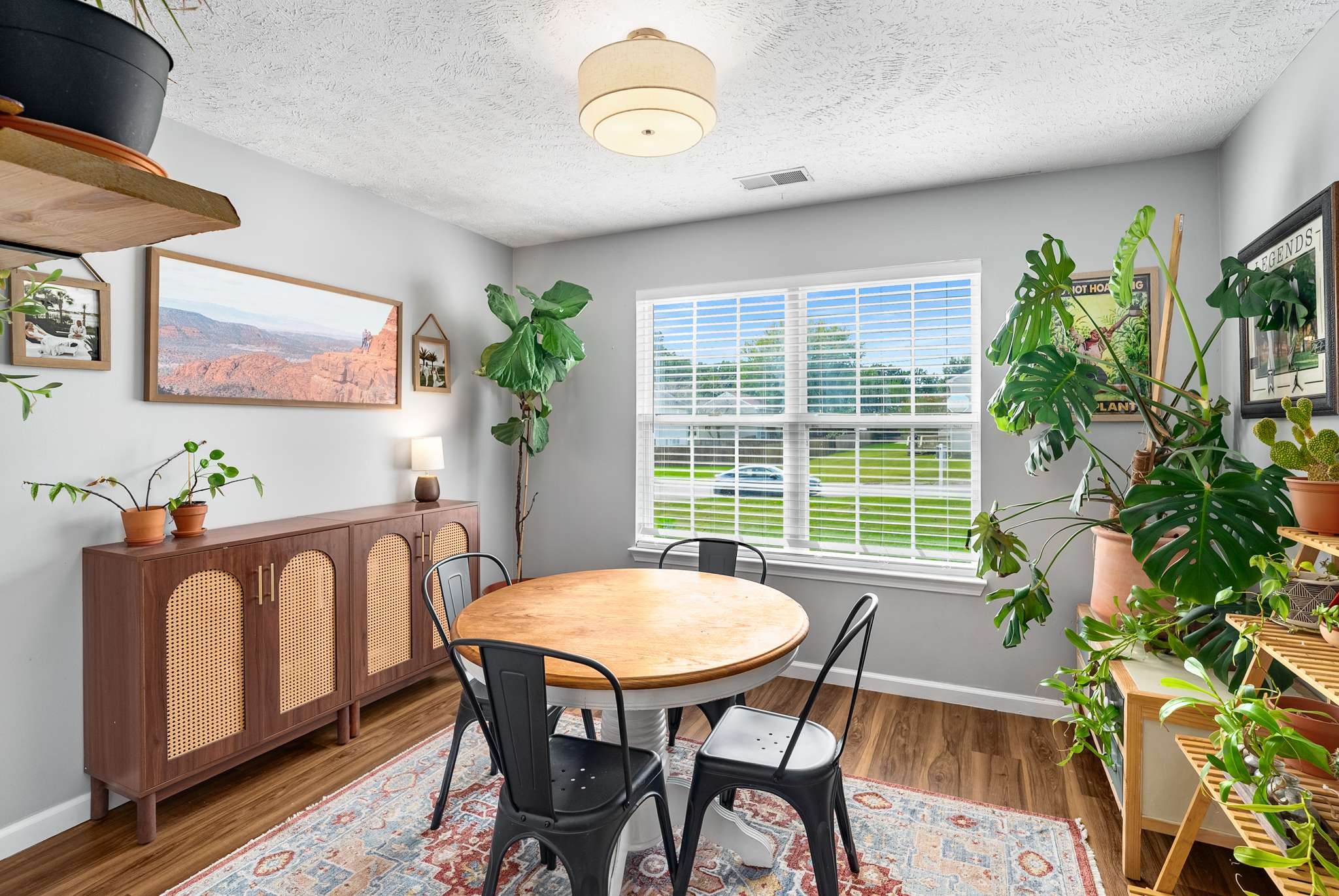 7222 Hidden Lake Drive Fairview, TN 37062 - Photo 10 of 21 a view of a dining room with furniture and a potted plant