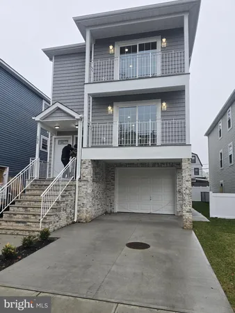a front view of a house with balcony
