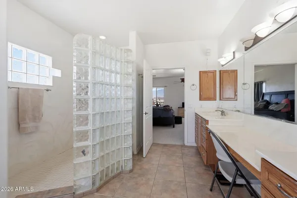 a kitchen with a refrigerator and a sink