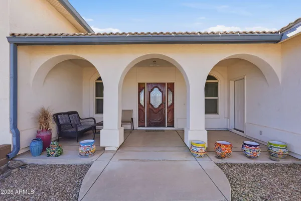 a front view of a house with patio