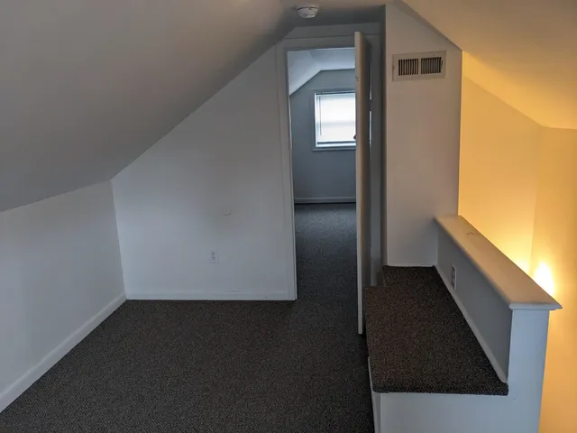 a view of hallway with stairs