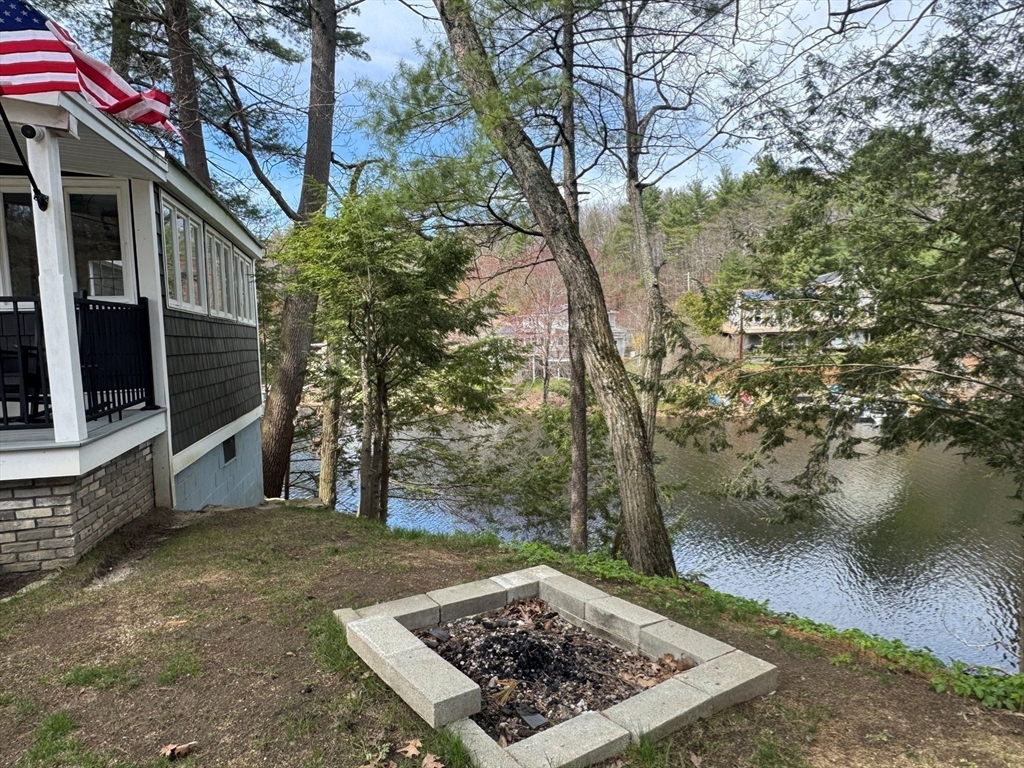 153 Off Pond Street Dunstable, MA 01827 - Photo 30 of 35 a view of a backyard of the house