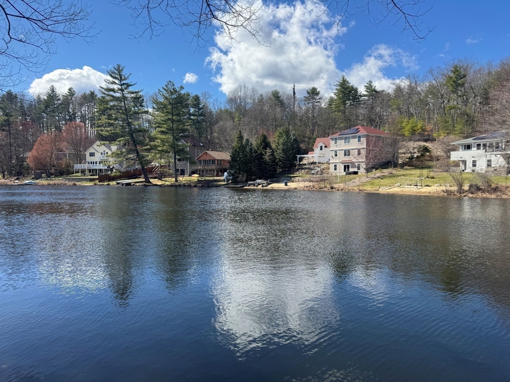 153 Off Pond Street Dunstable, MA 01827 - Photo 3 of 35 a swimming pool view with a lake view