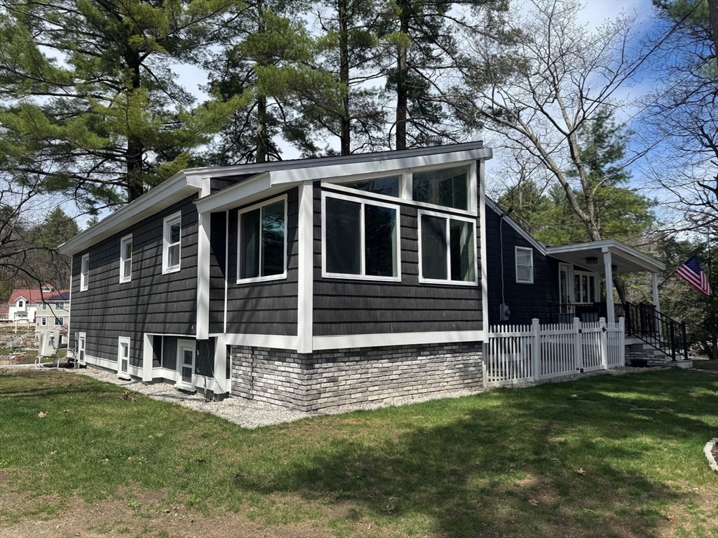 153 Off Pond Street Dunstable, MA 01827 - Photo 5 of 35 a view of house with a yard