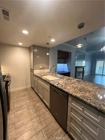 a large kitchen with a large counter top