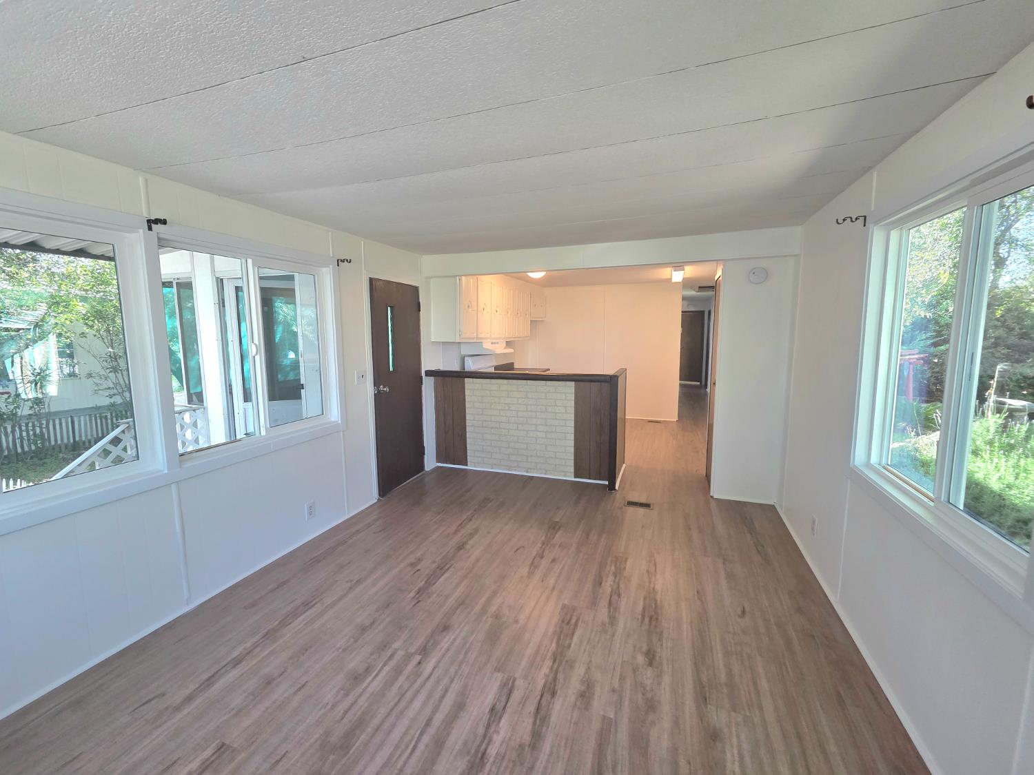 5200 Cavitt Stallman Road, Unit 35 Granite Bay, CA 95746 - Photo 11 of 31 a view of an empty room with a window and wooden floor