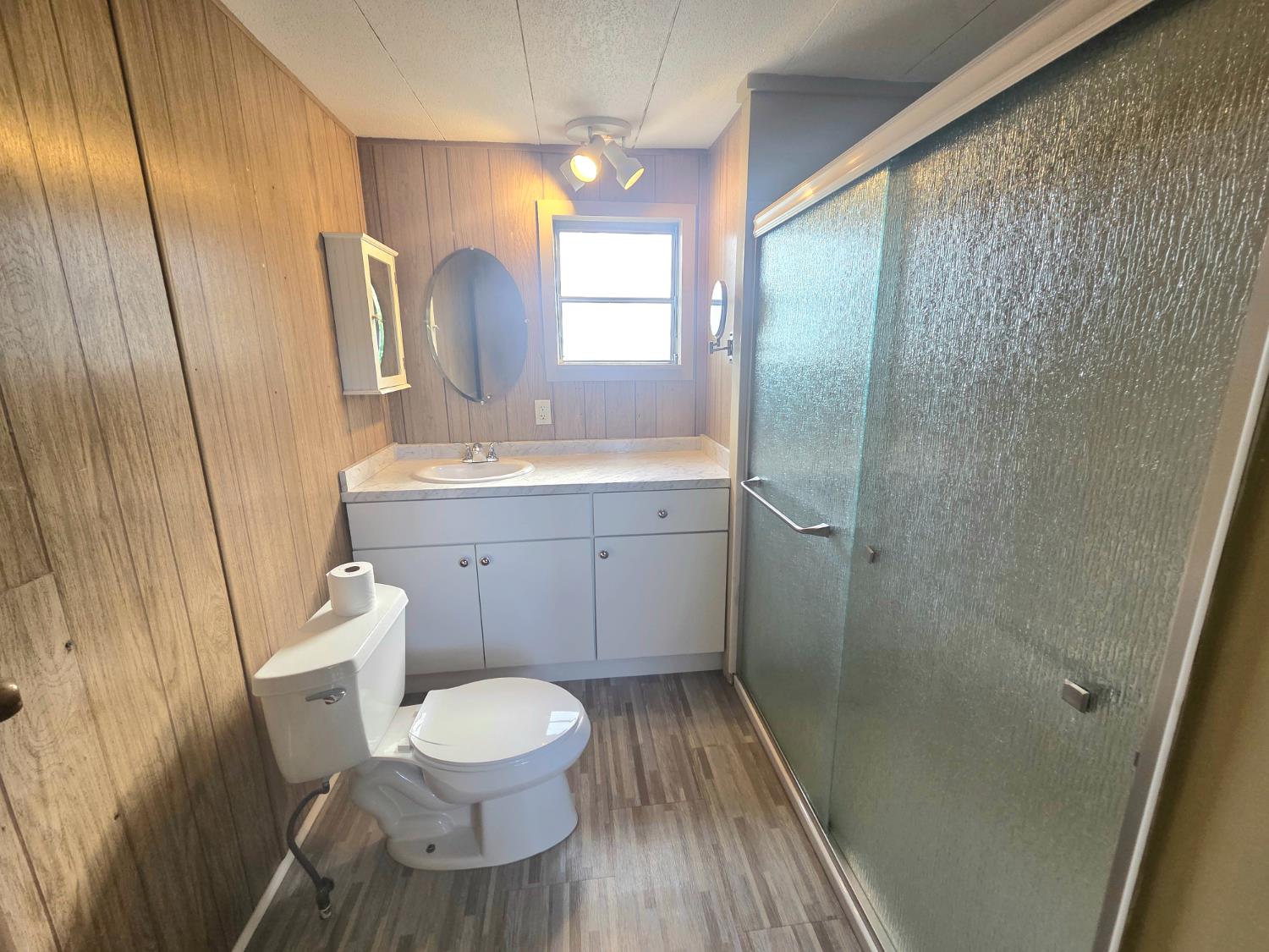 5200 Cavitt Stallman Road, Unit 35 Granite Bay, CA 95746 - Photo 14 of 31 a bathroom with a sink a toilet and shower