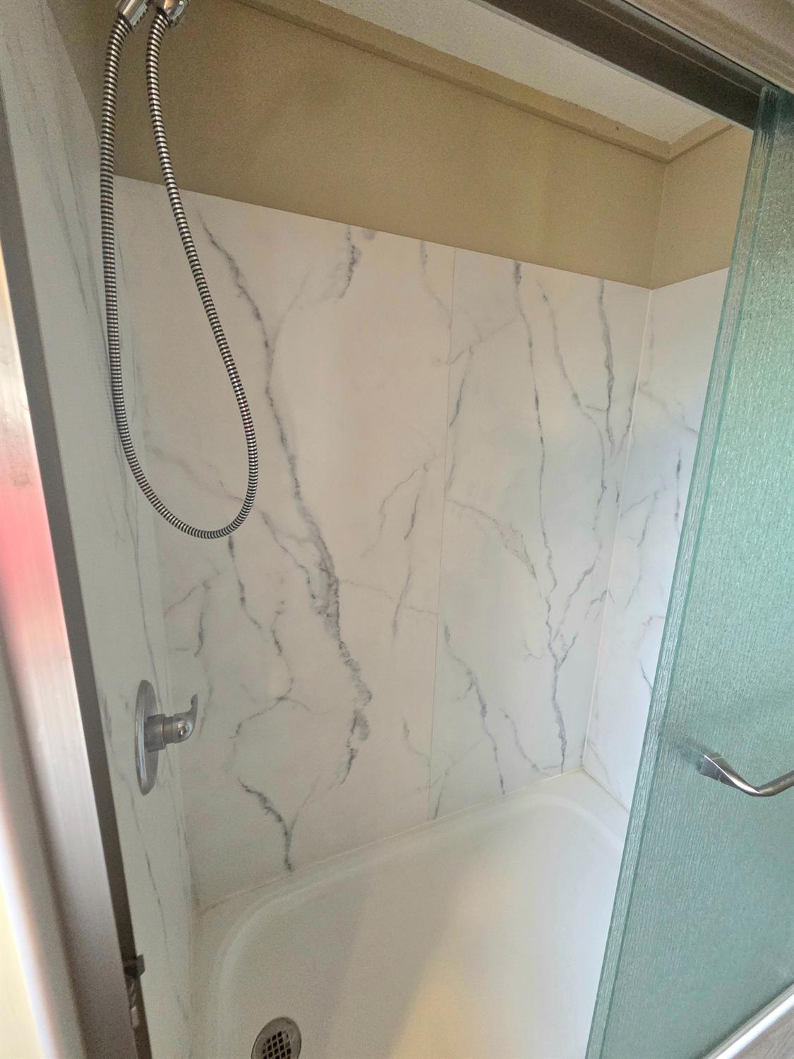 5200 Cavitt Stallman Road, Unit 35 Granite Bay, CA 95746 - Photo 15 of 31 a bathroom with a bathtub