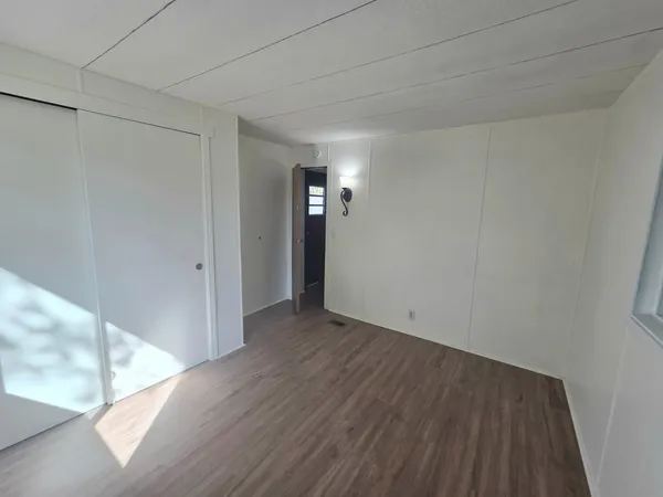 a view of a park with swings and slides