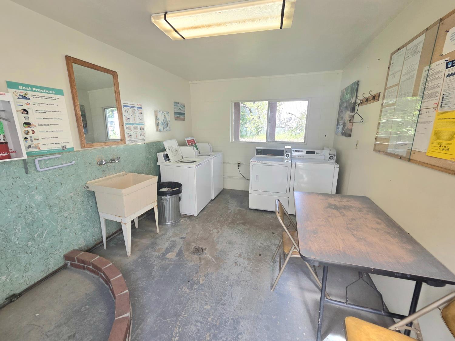 5200 Cavitt Stallman Road, Unit 35 Granite Bay, CA 95746 - Photo 21 of 31 a living room with furniture a window and a table