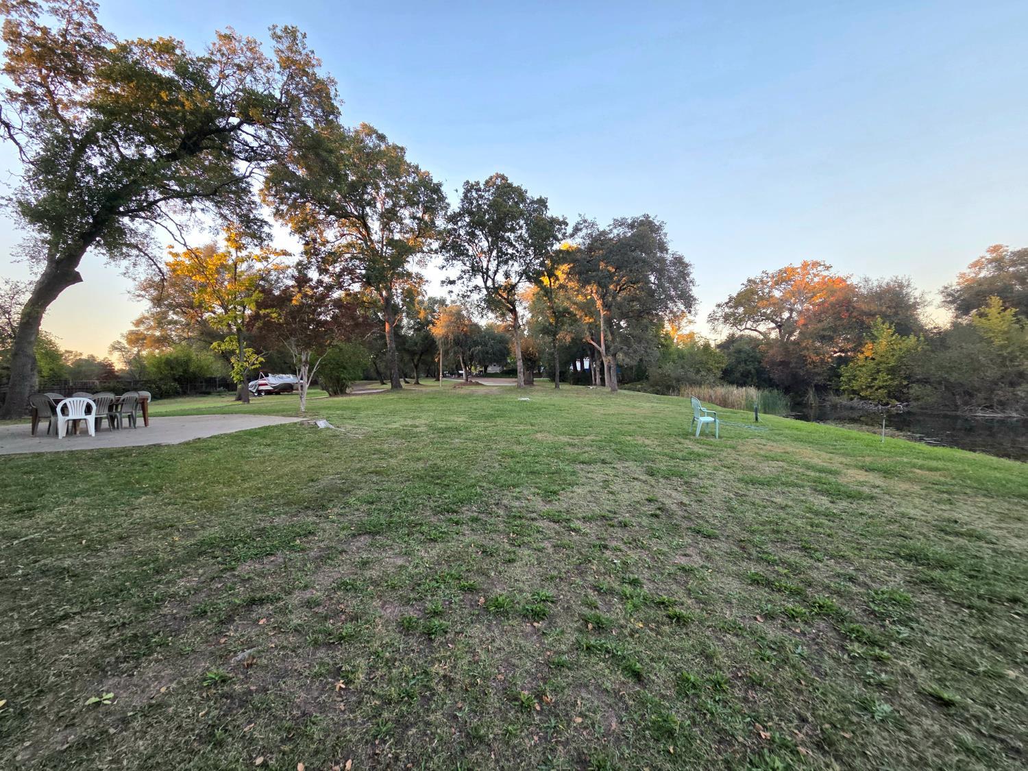 5200 Cavitt Stallman Road, Unit 35 Granite Bay, CA 95746 - Photo 24 of 31 a view of a grassy field with trees around