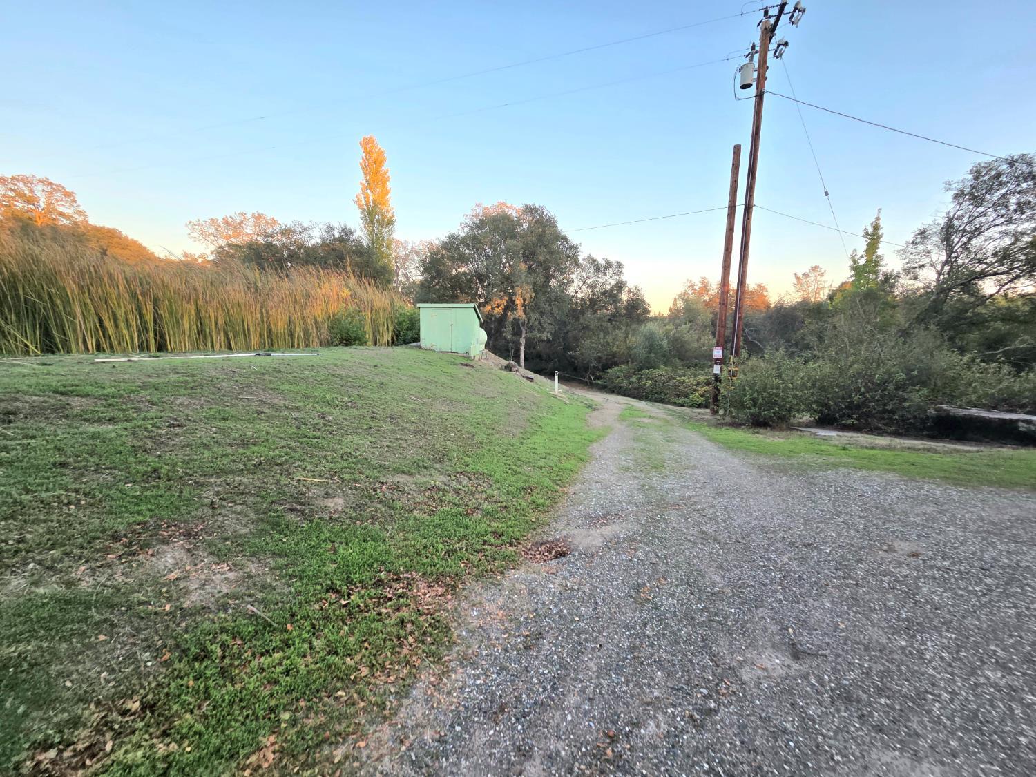 5200 Cavitt Stallman Road, Unit 35 Granite Bay, CA 95746 - Photo 30 of 31 a view of a grassy field with trees