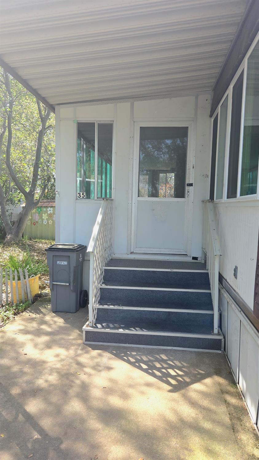 5200 Cavitt Stallman Road, Unit 35 Granite Bay, CA 95746 - Photo 7 of 31 a view of entryway with wooden floor and a front door