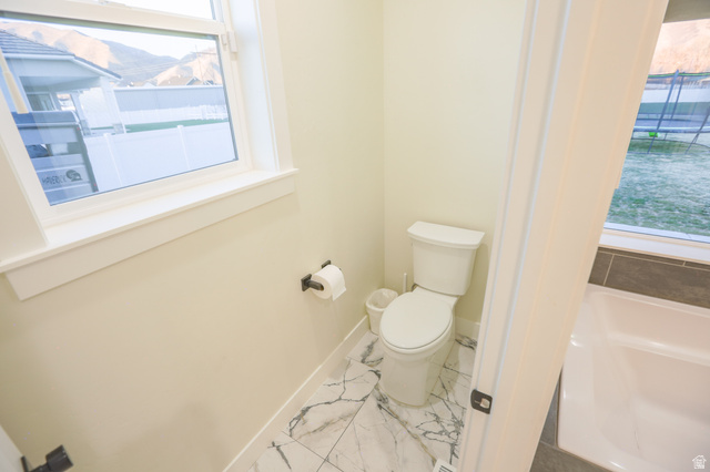 126 North 800 West Mapleton, UT 84664 - Photo 40 of 79 Full bathroom with a bath, plenty of natural light, and light marble finish flooring
