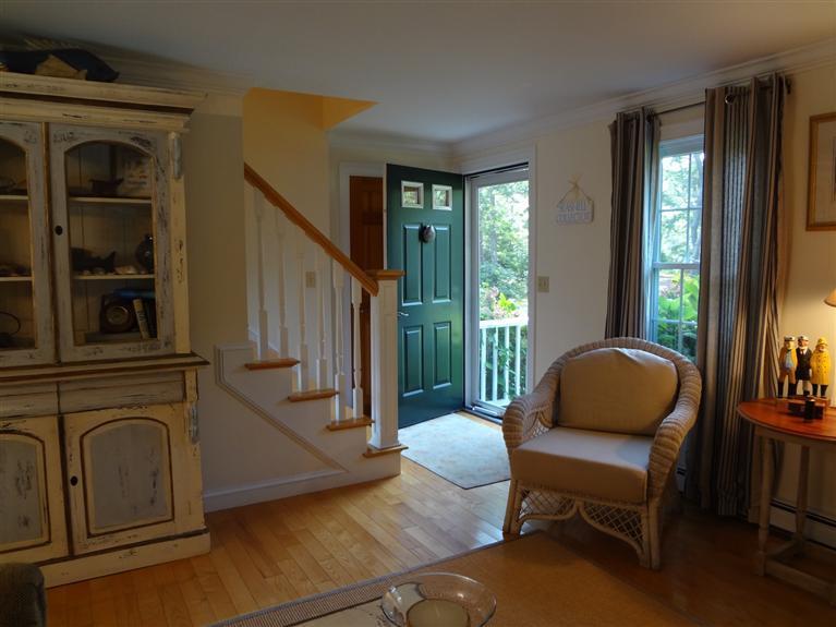 61 Clamshell Cove Road Cotuit, MA 02635 - Photo 3 of 12 a living room with furniture and a window