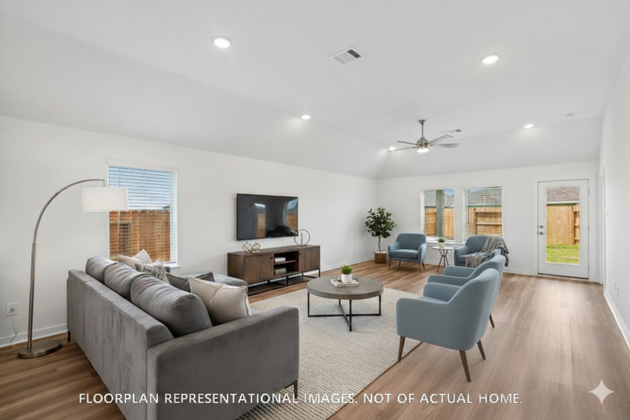 1908 Sleeping Hls Drive Rosenberg, TX 77471 - Photo 11 of 16 a living room with furniture and a flat screen tv