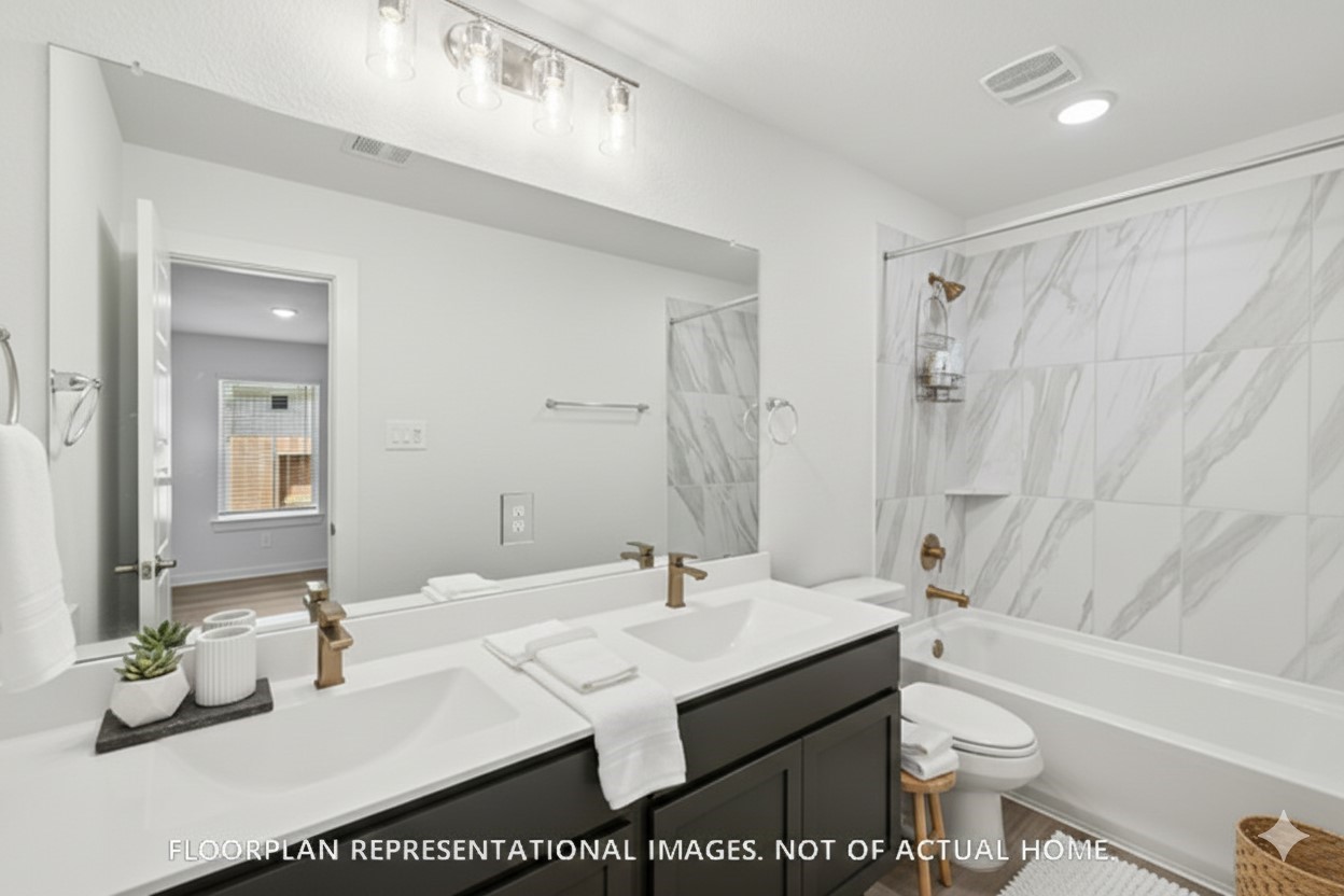 1908 Sleeping Hls Drive Rosenberg, TX 77471 - Photo 13 of 16 a bathroom with a sink a toilet and a mirror