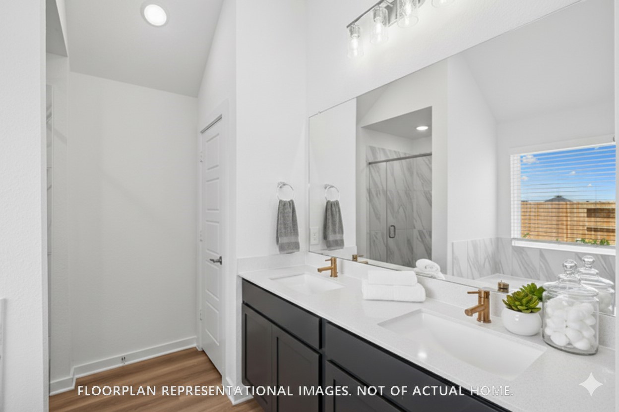 1908 Sleeping Hls Drive Rosenberg, TX 77471 - Photo 8 of 16 a bathroom with a sink and a mirror