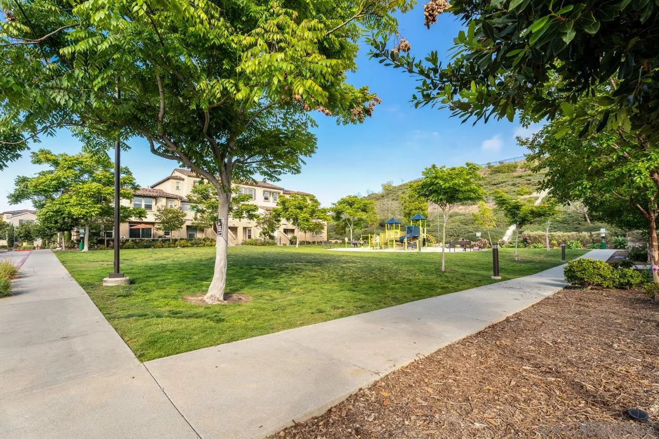 4326 Star Path Way, Unit 1 Oceanside, CA 92056 - Photo 36 of 46 a view of a garden with a fountain