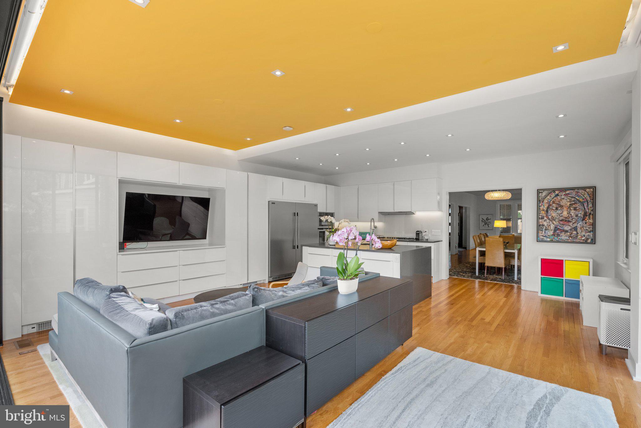 2815 39th Street Northwest Washington, DC 20007 - Photo 20 of 64 a living room with furniture and a flat screen tv