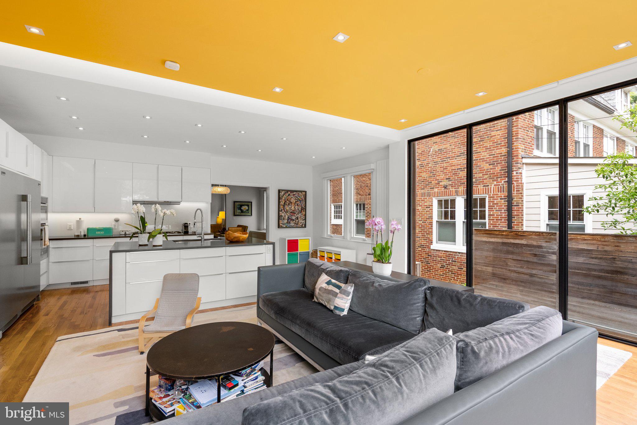 2815 39th Street Northwest Washington, DC 20007 - Photo 22 of 64 a living room with furniture and a large window